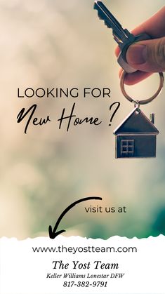 a hand holding a house key with the text looking for new home? visit us at