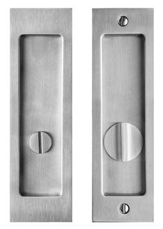 two stainless steel door handles with rounded knobs