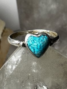 "Heart ring turquoise love Valentine band size 6.75 sterling silver women Size 6.75 Weight   1.8g Length   3/8\" Width   3/8\" Band.     3/32\" Free Shipping & Free Postal Insurance  Delivered in a Gift Box  Free First Class shipping and postal insurance is included. If you want to upgrade to priority kindly pay an additional fee to do so.  This is recommended if you would like to have your package delivered faster than first class which has slowed down" Turquoise Sterling Silver Jewelry For Promise, Spiritual Sterling Silver Turquoise Promise Ring, Turquoise Gemstone Heart Ring For Anniversary, Promise Ring In Turquoise Sterling Silver, Adjustable Silver Turquoise Ring For Anniversary, Heart-shaped Turquoise Sterling Silver Ring, Silver Stackable Turquoise Ring For Anniversary, Turquoise Heart Ring In Sterling Silver As Gift, Heart Shaped Silver Turquoise Ring In Sterling Silver