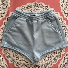 Nwot. Elastic Waist. Side Pockets. Cozy Material. Firm Price Cute Cotton Shorts In Solid Color, Cute Light Blue Cotton Bottoms, Basic Solid Shorts With Pockets, Light Blue Cotton Shorts With Pockets, Comfortable Blue Bottoms With Pockets, Cute Blue Shorts With Elastic Waistband, Cute Blue Shorts With Pockets, High Waist Light Blue Shorts With Elastic Waistband, Cozy Short Bottoms With Pockets