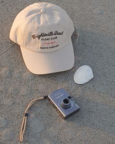 Inspired by North Carolina's east coast summers. Floating in the intercostal with sandy toes & sun-kissed skin. A beige cap with, dark brown embroidery, and a luxe satin interior lining. Beach Floats, Beige Cap, Brown Embroidery, Winter Headwear, Wrightsville Beach, Dad Cap, Dad Caps, Hat Band, Sun Kissed