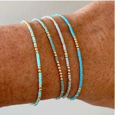 Super Cute And Dainty, These Bracelets Are Handcrafted With Delicate Mini Beads. Four Pieces -- Four Bracelets Total. Stretchable For Comfort. Beautiful Blue Ocean Colors -- Aqua, Turqoise, Pale Blue, Bright Blue. Easy On And Off; Perfect For Travel, Vacation, And Gifts. New, Never Worn Summer, Spring, School, Cute, Dainty, Beads, Stackable, Beaded, Comfort, Comfy, Gift, Cruise, Travel, Vacation, Beach, Beachy, Mini Beads, Stretch Bracelets Minimalist Beaded Bracelets With Spacer Beads, Minimalist Beaded Bracelets With Spacer Beads For Beach, Minimalist Beaded Bracelets For Beach With Spacer Beads, Boho Styl, Gelang Manik-manik, Diy Bracelet Designs, Gelang Manik, Beads Bracelet Design, Summer Bracelets