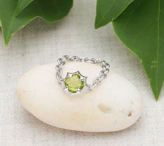 Brighten your day with the sparkly beauty of this unique flexible chain ring boasting a pineapple-cut peridot center. From Margo Manhattan. Peridot Jewelry, Peridot Ring, I Love Jewelry, Metal Work, Chain Ring, Cushion Cut, Brighten Your Day, Metal Working, Manhattan