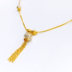 This impressive 22k gold necklace showcases a sleek design with a sophisticated blend of yellow and white gold finishes. Weighing 9.2 grams, it offers a luxurious yet comfortable feel. The combination of yellow and white gold enhances its modern and elegant appeal. With a necklace length of 18 inches and a drop length of 1.5 inches, this piece adds a touch of refined style to any outfit. The secure lobster lock ensures confident and comfortable wear. Elevate your jewelry collection with this exq Luxury 22k White Gold Necklaces, Gold Necklaces With Elegant Pendant Design, Gold Bridal Necklace With Pendant And Elegant Design, Yellow Gold Pendant Necklace With Elegant Design, Elegant Gold-plated Gold Necklace, Elegant Yellow Chain Necklace For Formal Events, Elegant Design Gold Plated Necklaces, Elegant Round Gold Plated Necklace, White Gold-plated Necklace With Gold Chain