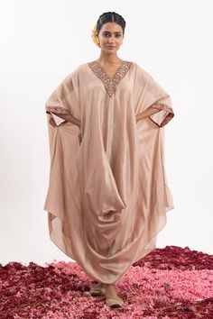 Peach asymmetric, cowl draped kaftan with placement hand embroidery in floral pattern. - Aza Fashions Silk Designer Dress With Draped Sleeves, Designer Silk Dress With Draped Sleeves, Silk Dress With Draped Sleeves For Designer Wear, Eid Dresses With Draped Sleeves And Traditional Drape, Eid Dresses With Draped Sleeves In Traditional Style, Traditional Draped Dress For Eid, Silk Dresses With Mirror Work And Draped Shape, Eid Dresses With Draped Sleeves, Embellished Draped Dress For Eid