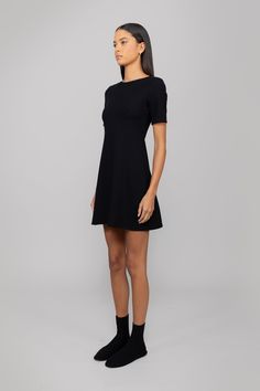 Crafted in our comfortably secure stretch ponte, The Rio Short Sleeve Mini Dress features a flattering, soft straight neckline, a slight flare, and the perfect mid-thigh length. Fit And Flare A-line Mini Dress In Elastane, Modern Fitted A-line Mini Dress, Flattering Elastane Mini Dress, Flattering Mini Length Elastane Dresses, Structured Mini Length Dress, Fit And Flare Elastane Formal Dress, Flattering A-line Elastane Dresses, Formal Fit And Flare Elastane Dress, Classic Midi Length Elastane Dresses