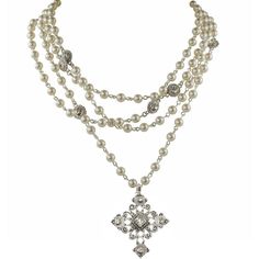 The romantic Magdalena necklace from Virgins, Saints & Angels is a multi-strand layered necklace in 6mm white pearls with a precious Medallion embellished with delicate clear crystal stones. Wear Long or Short. The Magdalena extender can be purchased for additional 4" length. Gold Plate Swarovski crystals Measures Necklace 16"-18" Cloister Pendant 1.5" dia, San Benito and Sacred Heart 1" wide, 1.5" long Toggle clasp VSA packaging Pearl White Multi-strand Necklace With Pearl Pendant, Multi-strand Pearl Pendant Necklace For Wedding, Multi-strand Pearl White Necklace With Pearl Pendant, Elegant Silver Multi-strand Pearl Necklace, Elegant Multi-strand Silver Pearl Necklace, White Multi-strand Necklace With Pearl Pendant, Pearl White Multi-strand Pearl Chain Necklaces, Pearl White Multi-strand Pearl Chain Necklace, Lulu Frost