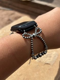 Upgrade your Apple Watch with our Bowtie Apple Watch Band, featuring .925 machine-made Navajo Pearls for a chic and stylish look. With expert craftsmanship and a touch of elegance, this band will elevate your style while remaining functional. Perfect for any occasion. Fits watch band: 38mm, 40mm, 41mm, 42mm, 44mm, 45mm Leave size in comment ~~~Apple watch not included-~~~ Adjustable Silver Bracelet Strap Watch Bands, Adjustable Silver Beaded Apple Watch Band, Silver Apple Watch Bracelet Strap Band, Silver Bracelet Strap Apple Watch Band, Adjustable Silver Bracelet Strap Apple Watch Band, Adjustable Silver Bracelet Apple Watch Band, Adjustable Silver Beaded Watch Bands, Bohemian Adjustable Silver Apple Watch Band, Silver Adjustable Bohemian Apple Watch Band