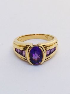 Heirloom Multi-stone Amethyst Ring, Oval Multi-stone Amethyst Ring For Formal Occasions, Formal Oval Amethyst Multi-stone Ring, Formal Multi-stone Oval Amethyst Ring, Purple Ruby Ring For Formal Occasions, Formal Oval Amethyst Ring With Multiple Stones, Heirloom Multi-stone Purple Amethyst Ring, Formal Purple Multi-stone Amethyst Ring, Purple Amethyst Hallmarked Signet Ring