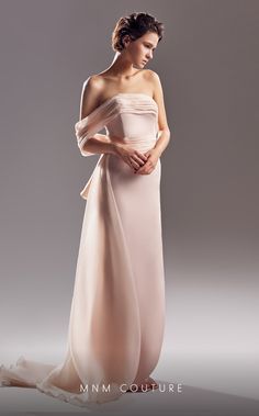 Elevate your style and make a stunning entrance in the MNM Couture One Shoulder Crepe Evening Dress. This exquisite gown is perfect for couture events, evening occasions, or even as the mother of the bride. Crafted from luxurious crepe fabric, it offers a sleek and fitted silhouette that accentuates your curves in all the right places. The one-shoulder neckline adds a touch of elegance and sophistication, while the strapless design showcases your shoulders and décolletage. The dress features bea Plus Size Gowns Wedding, Mnm Couture, Jasz Couture, Straight Across Neckline, Plus Size Gowns, Exquisite Gowns, Gown Plus Size, Column Dress, Bridal Couture