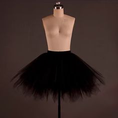 Black Tulle Super Fluffy With Elastic Waistband And Lining. Measurements Shown Would Say Closer To Medium Large Knee Length Open To Offers Black Fitted Tulle Mini Skirt, Fitted Black Tulle Mini Skirt, Black Summer Petticoat For Costume Party, Black Summer Tulle Petticoat, Summer Black Tulle Petticoat, Black Tulle Petticoat For Summer, Elegant Black Tulle Bottoms, Black Stretch Petticoat For Spring, Black Spring Petticoat