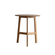 a wooden stool with a round seat on the bottom and legs, against a white background