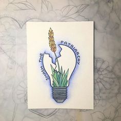 a drawing of a light bulb with a plant growing out of it's center