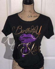 a mannequin wearing a birthday tshirt with purple lipstick on the front