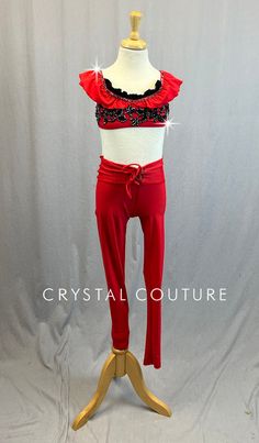 Red camisole bra top has Red ruffle along neckline and on straps. Black appliques on front of chest and Black ruffle peeking out of neckline. Paired with Red leggings with tie front waistband. 5.5 Gross of Jet Hematite 9ss, 12ss, 16ss, 20ss and 30ss Rhinestones! **Costume in image is a YM, Photographed on a YM/YL Mannequin with Measurements of: Bust 27", Waist 24", Hip 27", Girth 47" Red Ruffled Sleeveless Sets, Red Fitted Sleeveless Bottoms, Fitted Red Ruffled Sets, Sleeveless Red Ruffled Set, Red Fitted Bottoms, Fitted Red Bottoms With Ruffles, Fitted Red Ruffled Bottoms, Trio Costumes, Sequin Jewelry