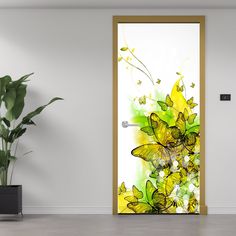 an open door with yellow flowers and butterflies painted on the glass next to a potted plant