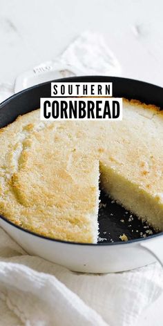 a close up of a cake in a pan with the words southern cornbread on it