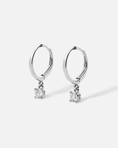 Elevate your style with ROEN's SELENE Diamond Drop Huggie Earrings. A classic design meets playful elegance in these brilliant earrings, featuring half a carat total weight of diamonds that delicately cascade and flow, capturing light with every movement. A perfect blend of sophistication and fluid charm. Diamond Huggies, Bespoke Engagement Ring, Pave Pendant, Colorless Diamond, Diamond Drops, Huggie Earrings, Fine Jewelry Collection, Diamond Bracelets, Fine Jewellery Earrings