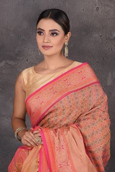 Flaunt ethnic look on festive occasions in this stunning pink Kanjeevaram cotton sari. The saree is enhanced with pink zari border and pallu. It comes with a matching blouse piece. Shop Kanjeevaram arees in USA from Pure Elegance. Disclaimer: The shown stitched blouse on the model is for display purpose only. The saree comes with a matching blouse piece and finished with fall and piko. Pink Saree With Unstitched Blouse For Transitional Season, Transitional Pink Saree With Zari Work, Transitional Pink Saree With Unstitched Blouse, Transitional Pink Chanderi Pre-draped Saree, Pink Cotton Silk Pre-draped Saree With Self Design, Bollywood Style Pink Saree For Transitional Season, Pink Bollywood Saree For Transitional Season, Transitional Pink Banarasi Silk Pre-draped Saree, Transitional Season Pink Banarasi Silk Pre-draped Saree