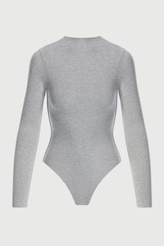 The power of a perfect basic. Constructed from our signature fabrication, our classic bodysuit molds to your frame with a second-skin fit, mock neckline, long fitted sleeves, and thong back with baby snap closure down below. A versatile piece that can be dressed up or down. NW Collection Legacy Collection Import 95% Viscose, 5% Spandex Model wears size X-Small True to size Double-lined All Bodysuits Are Final Sale Mock Neck Bodysuit, Naked Wardrobe, Fitted Sleeves, Swim Shop, Mock Neckline, Womens Bodysuit, Night Looks, Fit Style, Layering Pieces