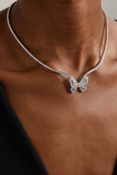 Enchanting and delicate, De Beers' 'Butterfly' necklace is part of the 'Portraits of Nature' collection. The structured 18-karat white gold chain holds the mystical insect perfectly at the crook of your neck and is liberally sprinkled with G+ VS+ diamonds. Each stone has been selected by eye before being cut and polished by world-renowned diamantaires to enhance its natural brilliance. Luxury Sterling Silver Butterfly Necklace, Butterfly-shaped White Gold Jewelry For Wedding, Luxury White Gold Butterfly Pendant Necklace, White Gold Butterfly Jewelry For Wedding, Fine Jewelry Butterfly Piece For Wedding, Fine Jewelry Butterfly Shape For Wedding, Fine Jewelry Butterfly Necklaces In White Gold, Luxury Butterfly Charm Pendant Jewelry, Luxury Jewelry Pendant With Butterfly Charm