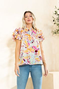 Nothing Left to Say lets you play it cool in ruffled comfort. This multi-color blouse features a ruffle neck and ruffle sleeves, relaxed fit and a button and keyhole back for a casually chic look that lets you say little but radiate a fun and carefree vibe. Perfect for days when all you want to do is sip coffee and people watch. 100% Polyester Want to view this on the *Live* Sizing & Styling Guide?! Watch it in the photo section above or by clicking here! *You will need to scan through to find t Trendy Spring Puff Sleeve Top With Ruffles, Trendy Puff Sleeve Top With Ruffles For Spring, Casual Printed Blouse With Butterfly Sleeves, Chic Flowy Top With Flutter Sleeves, Chic Flowy Flutter Sleeve Tops, Summer Butterfly Sleeve Printed Blouse, Summer Printed Blouse With Butterfly Sleeves, Trendy Puff Sleeve Top With Ruffles For Brunch, Chic Flowy Top With Ruffle Sleeves