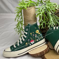 🌿 Love Embroidered Converse 🌿 ❤️ About Our Products: Each pair of shoes from our store is brand new and hand-embroidered to order. Please ensure you select the correct shoe size before checkout. The embroidery is durable and won't fade over time. ✨ Personal Expression: Showcase your unique style with custom embroidery! Contact me to create your own embroidered shoes with a private listing. I'll send you the design for approval before embroidering the shoes. Alternatively, you can design your p Summer Sneakers With Appliques And Round Toe, Embroidered Sneakers For Spring, Embroidered Closed Toe Sneakers For Spring, Spring Embroidered Sneakers, Green Cotton Sneakers For Spring, Spring Embroidered Canvas Shoes With Round Toe, Floral Embroidered Summer Sneakers With Round Toe, Floral Embroidered Sneakers With Round Toe For Summer, Floral Embroidered Summer Sneakers