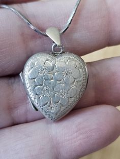 Great gift for heart and locket lovers! Silver Vintage Locket, Classic Heart Jewelry For Collectibles, Classic Heart-shaped Collectible Jewelry, Classic Heart Shaped Collectible Jewelry, Collectible Medallion Jewelry For Valentine's Day, Stamped 925 Round Pendant Keepsake Jewelry, Vintage Sterling Silver Jewelry For Valentine's Day, Personalized Heart Jewelry Collectible, Engraved Jewelry Collectible For Valentine's Day