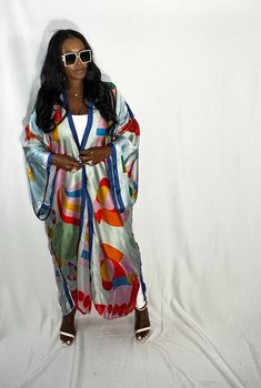 Rich Auntie at it's finest! Our fashion satin kimono can be worn as an oversized dress on it's own or cinched at the waist for a more fitted look. Flowy and colorful style definitely can make this a beach coverup or vacation look. In One Size fits most as the sleeves are open flowy and the kimonos have an open front. Size US Size One Size Rich Auntie, Swim Jewelry, Red Lavender, Open Front Kimono, Summer Kimono, Satin Kimono, Vacation Looks, Oversized Dress, Long Kimono