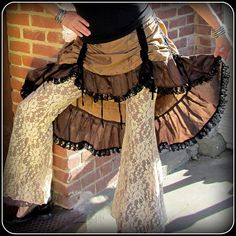 Steampunk Bustle Skirt Mix of Sepia Tone by TalismanaDesigns Steampunk Tiered Skirt For Cosplay, Steampunk Skirt For Halloween Festival, Steampunk Costume Skirt With Attached Cancan, Gothic Ruffled Skirt For Cosplay, Can-can Skirt For Costume Party, Fitted Ruffled Skirt For Costume Party, Steampunk Ruffled Skirt For Cosplay, Steampunk Tiered Skirt For Costume Party, Steampunk Bottoms For Halloween Costume Party