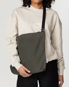 We've upgraded our Water Resistant Messenger Bag in Dark Olive - the perfect accessory for all your adventures, big and small. Now with interior pocket and key hook. Made from waxed organic rip-stop cotton in the UK, this bag is built to last. It's zipped fastening and adjustable strap keep your belongings safe and secure, while the metal G hooks make it easy to adjust on the go. Plus, its rugged good looks ensure it's suitable for all genders. Whether you're using it to store your laptop and bo Uni Bag, Key Hook, Cargo Pant, Stocking Fillers, Everyday Carry, Large Bags, Sweatshirt Shirt, Short Pants, Manchester