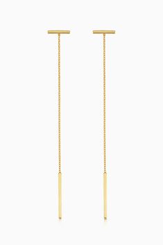 A long vertical line dropping from a short horizontal bar, creates the stunning linear visual that is our Tea Time Drop Earrings. Sure to be a quick favorite, they are light and easy to wear, at tea time, a night out and pretty much everywhere in between. Metal: 14k Yellow Gold Weight: 1.2 Grams Crafted in San Zeno, Vicenza, Italy Minimalist Long Drop Threader Earrings For Formal Events, Minimalist Long Drop Threader Earrings For Formal Occasions, Modern Long Drop Linear Earrings With Adjustable Chain, Modern Linear Long Drop Earrings With Adjustable Chain, Minimalist Formal Linear Earrings With Delicate Chain, Modern Long Drop Yellow Gold Linear Earrings, 14k Gold Linear Earrings With Long Drop, Minimalist 14k Gold Linear Earrings With Adjustable Chain, Minimalist Yellow Gold Linear Earrings With Delicate Chain