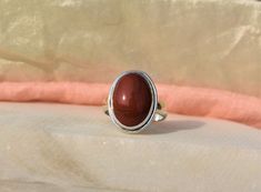 "Simple Coral Ring, Stacking Ring, Oval Gemstone Ring, Silver Ring, Birthstone Ring, Statement Ring, Dainty Ring, Sale Ring, Gift Jewelry \"\"Gemstone Size depends on the Ring Size.\"\" Most of the Products are Made to Order. No two gemstone are similar and images cannot define exact product definitions. Sizes - Available in all Sizes US 1 - US 15 Shipping Policy - I mainly use USPS , DHLE Global Mail Asia, UPS, FedEx for the shipping of goods depending on the amount and days that you have order Oval Ruby Ring With Stone Setting, Oval Spiritual Ring With Polished Finish, Oval Spiritual Rings With Polished Finish, Oval Rings With Stone Setting As A Gift, Spiritual Oval Rings With Stone Setting, Spiritual Oval Crystal Ring With Stone Setting, Oval Rings With Stone Setting, Adjustable Oval Ruby Ring, Spiritual Oval Gemstone Rings