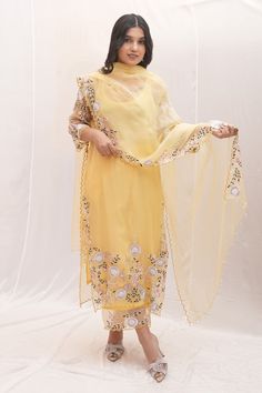 Yellow sheer kurta with thread embroidered floral motifs, pearl embellishments and scalloped borders. Comes with culottes, undershirt and dupatta. - Aza Fashions Yellow Organza Sets For Navratri, Yellow Organza Kurta For Festivals, Spring Wedding Kurta With Dori Work, Spring Yellow Anarkali Set For Wedding, Spring Wedding Yellow Anarkali Set, Yellow Organza Kurta For Festive Occasions, Yellow Organza Sets With Dori Work, Festive Yellow Organza Kurta, Yellow Georgette Kurta With Sheer Dupatta