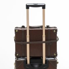 Inspired by the greatest period of traveling, the roaring 1920s, Cotrunkage’s handcrafted minimalism vintage luggage set features a dense wrap-around microfiber leather body that is complemented by heavy-duty corned stitching for maximum protection. The soft leather handle is plush to the touch and wears handsomely over time as the bronze TSA locks lighten with every adventure. We’ve also woven art print lining across the entire bag for a touch of detail and chic flair to sharpen your look. So p Roaring 1920s, 3 Piece Luggage Set, Leather Suitcase, Woven Art, Vintage Luggage, Train Case, Caramel Brown, Luggage Sets, Weaving Art