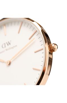 A wide, minimalist face adds to the clean sophistication of this lightweight round watch secured by a classic topstitched leather strap. Style Name:Daniel Wellington Classic St. Mawes Leather Strap Watch, 40mm. Style Number: 6167093. Available in stores. Round Watch, Leather Strap Watch, Diy Kits Gift, White Rose Gold, Minerals Crystals, Daniel Wellington, Wellington, Quartz Movement, Time Piece