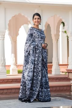 This beautiful handmade Batik print saree is a celebration of traditional Indian craftsmanship. Made from pure cotton, the saree is soft, breathable, and comfortable, perfect for all-day wear. With a length of 6.4 meters, it drapes elegantly, showcasing intricate Batik designs that are both timeless and stylish. The accompanying blouse piece measures 0.90 meters, allowing for a perfect fit. Ideal for both casual and festive occasions, this saree adds a touch of grace and sophistication to any wardrobe. - **Material Pure Cotton for ultimate comfort and breathability. - **Design Traditional Batik print, showcasing intricate handmade designs. - **Saree Length 6.4 meters, providing ample fabric for elegant draping. - **Blouse Piece Includes a 0.90-meter blouse piece, customizable for a perfect Bollywood Cotton Pre-draped Saree For Wedding, Festive Cotton Pre-draped Saree With Block Print, Cotton Pre-draped Saree For Puja During Navratri, Festive Bollywood Saree With Batik Print, Bollywood Style Cotton Pre-draped Saree For Puja, Cotton Pre-draped Saree With Unstitched Blouse For Wedding, Bohemian Batik Print Saree With Traditional Drape, Bohemian Saree With Batik Print, Bohemian Batik Print Traditional Saree