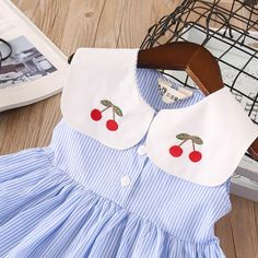 Product Title: Girls Lapel Striped Dress Sleeveless Cherry Embroidered Princess DressKeyword Tag: Bulk Toddler Socks*Pattern: Fruit*Soft Feeling & Cozy Comfortable* Available for Machine Wash as well as TumbleDry* Imported Are you look for a best quality and affordable dress? Then Girls Lapel Striped Dress Sleeveless Cherry Embroidered Princess Dress is the best one for you! The New style with amazing designs for reflect fashion vibes that will embrace you the moment you wear them. The pattern o Cute Doll Collar Dresses For Summer, Cute Doll Collar Summer Dresses, Cute Summer Dresses With Doll Collar, Cute Light Blue Doll Collar Dress, Cute Light Blue Dress With Doll Collar, Playful Blue Sleeveless Summer Dress, Playful Doll Collar Summer Dress, Playful Summer Dress With Doll Collar, Sweet Sleeveless Cotton Dress