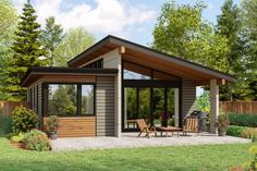 a small house with a patio and picnic table