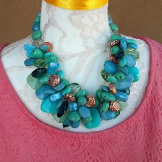 Unique Colorful Chunky Turquoise Party Statement Necklace was inspired by a picture of Princess Sophia wearing a Famous Designer Necklace. Instead of the Classic Pearls I chose to make it with large acrylic beads and other turquoise beads that provide drama but no WEIGHT!I also used copper glass flower beads. It makes a very bold statement. Measures 20"s. It has a lovely magnetic clasp for easy attachment. Please let me know if you need the length adjusted. Get ready for compliments!!! This neck Turquoise Party, Pictures Of Princesses, Princess Sophia, Turquoise Statement Necklace, Chanel Necklace, Chanel Pearls, Necklace Colorful, Copper Glass, Designer Necklace