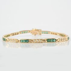 This bracelet is set in 14K Solid Yellow Gold, Studded with Princess-cut Emeralds and Round Diamonds; Three emeralds alternating with three diamonds. A luxury jewelry gift for your loved ones. -Material - 14K Solid Yellow Gold -Gemstone - Emeralds & Diamond -Gemstone Weight - 2.070 ct -Diamond Weight - 0.390 ct -Gross weight - 12.0 grams The bracelet length can be adjusted to your wrist size, on request. You can also go to my shop Home for more similar bracelets: https://www.etsy.com/in-en/shop/ Luxury Jewelry Gift, Bracelet Christmas, Emerald Bracelet, Gold Armband, May Birthstone, Birthstone Bracelets, Minimalist Bracelet, Dainty Bracelets, Emerald Diamond