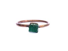 Rough emerald ring | Raw Emerald birthstone ring | Raw stone jewelry | Raw emerald jewelry | Raw emerald ring | May birthstone jewelry This listing is for one small green emerald crystal electroformed to a hand-hammered 16 gauge recycled copper ring.  If your size is unavailable, please select "custom" from the drop down menu and indicate the size you need at check out. Our jewelry is unique and one-of-a-kind. Please note there will likely be variances in the size, shape and color of each stone. Green Gemstone Stackable Rings For May Birthstone, Stackable Green Emerald Ring, Stackable Emerald Promise Ring, Everyday Emerald Birthstone Jewelry, Green Stackable Rings For May Birthstone, Stackable Emerald Cut Emerald Jewelry, Stackable Emerald Ring For May Birthstone, Green Emerald Birthstone Ring For May, Green Emerald May Birthstone Ring