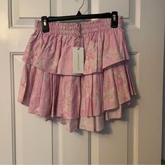 Brand New! Loveshackfancy Ruffle Mini Skirt - Blush Pink. Gorgeous Pink Floral, Classic Loveshackfancy Style - A Little Longer In The Back, Shorter In The Front, Shorter On The Sides. Current Style, Size Small Is Sold Out! Please See My Other Listings! Bundle Discounts, Shipping Discounts Available And I Consider Any Reasonable Offer! My Listings Are From Our Home, Not Thrifted - I’d Love To Work With You To Pass On Anything You Love! Feminine Pink Skirt For Brunch, Pink Feminine Skirt With Ruffle Hem, Feminine Pink Skirt With Ruffle Hem, Pink Ruffle Hem Bottoms For Brunch, Pink Ruffled Skirt Bottoms For Brunch, Pink Ruffled Bottoms For Brunch, Pink Ruffled Skirt For Day Out, Pink Feminine Skirt For Vacation, Feminine Pink Skirt For Vacation