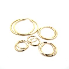 These Italian-made 10k gold sleepers make a timeless addition to any jewelry collection. Their hollow tube construction makes them light weight, and their exceptional price point makes them perfect for layering multiple pairs. Available in multiple sizes. Gold Sleeper Earrings, Guitar String Jewelry, Eco Luxury, Sleeper Earrings, Heart Strings, Gold Jewelry Necklace, Back Jewelry, 10k Gold, Ring Bracelet