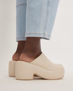 The Puffa Clog Parchment – Everlane Synthetic Slip-on Platform Slippers With Padded Heel, Casual Slip-on Mules With Padded Heel, Synthetic Platform Slip-on Slippers With Padded Heel, Synthetic Platform Slippers With Padded Heel, Synthetic Platform Slippers With Padded Heel And Round Toe, Synthetic Slip-on Platform Slippers With Rubber Sole, Chic Spring Clogs With Chunky Platform, Slip-on Closed Toe Platform Slippers, Chic Chunky Platform Clogs For Spring