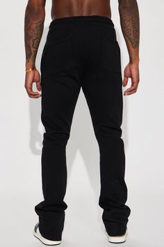 Model Height: 6'1 - Waist: 32 - Wearing Large Big & Tall: Height 6'3 - Waist: 42 - Wearing XXXL Available In Black. Elastic Waistband Drawstring Side Hand Pockets 60% Cotton, 40% Polyester Imported | Mens Tyson Skinny Stacked Flare Sweatpant in Black size Large by Fashion Nova Urban Fitted Activewear For Streetwear, Casual Black Fitted Joggers, Casual Fitted Black Joggers, Fitted Tapered Leg Streetwear Bottoms, Fitted Tapered Leg Bottoms For Streetwear, Fitted Black Casual Sweatpants, Basic Black Fitted Bottoms, Basic Fitted Black Bottoms, Fitted Full-length Cotton Sweatpants