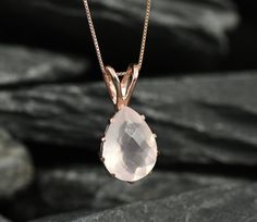 Rose Quartz Pendant set with a Natural Rose Quartz in a teardrop diamond cut shape & smokey pink colour, sourced from Brazil, at 16x12mm, 10 Carats. Teardrop Pendant design made of Solid 925 Sterling Silver ☞ made to last. **The pendant is plated with 18K Rose Gold (the thickest plating - 3 Micron) over Solid 925 Sterling Silver. Free Gold Vermeil Chain with every Pendant order, 18 inch Silver chain (46 cm) ✓ Matching Ring and matching Earrings - please ask me January Birthstone - Genuine & Natu Rose Quartz Necklace Pendants, Morganite Pendant, Teardrop Diamond, Rose Quartz Jewelry, Rose Gold Quartz, Blue Topaz Pendant, Rose Quartz Pendant, Rose Quartz Necklace, Ruby Pendant