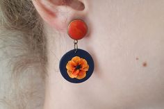 Vibrant orange flower earrings, Clay earrings, Dark blue and orange dangle polymer clay earrings, Statement earrings ▲Currently, the preparation time is 4-6 weeks. After that, I can ship the orders. FEDEX priority shipping takes: 2-3 WORKDAYS ( USA ). These are unique, handmade, polymer clay earrings with spring orange flower motifs. These beautiful earrings are pieces of original and unique artwork. The method is known as 'appliqued technique'. Using tiny pieces of clays and a sharp needle. I d Handmade Orange Dangle Flower Earrings, Orange Dangle Earrings Polymer Clay, Orange Dangle Earrings In Polymer Clay, Orange Dangle Polymer Clay Earrings, Orange Dangle Polymer Clay Jewelry, Orange Polymer Clay Dangle Jewelry, Orange Polymer Clay Dangle Earrings, Orange Dangle Jewelry In Polymer Clay, Orange Dangle Flower Earrings Gift