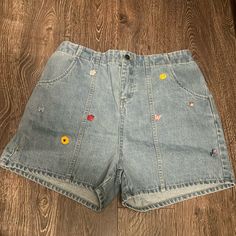 Brand New Teddy Fresh Denim Shorts With Appliqus And Embroidery Patch Pockets 100% Cotton Back Elastic For Extra Comfy. Good For Tummy Control Relaxed Fit Denim Blue Bottoms With Floral Embroidery, Denim Blue Relaxed Fit Bottoms With Floral Embroidery, Cute Summer Denim Skirt, Casual Denim Blue Bottoms With Floral Embroidery, Casual Cotton Bottoms With Floral Embroidery, Denim Blue Bottoms With Floral Embroidery And Relaxed Fit, Cute High Waist Denim Bottoms, Denim Blue Cotton Bottoms With Floral Embroidery, High Waist Denim Bottoms With Floral Embroidery