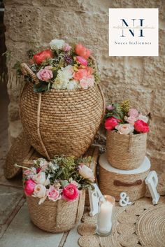 baskets with flowers and candles on the floor